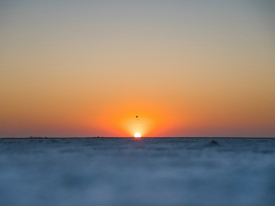 Wide sunset landscape of the Rann of Kutch salt desert in Gujarat