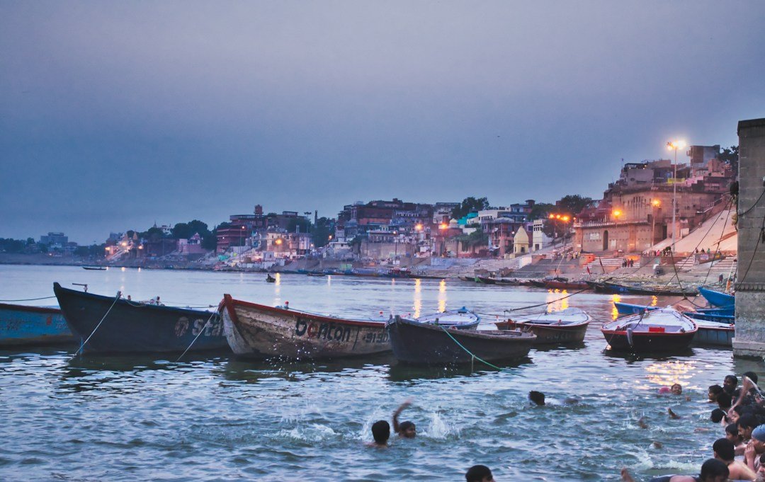 Boats beside the historic ghats along the Ganga in Varanasi